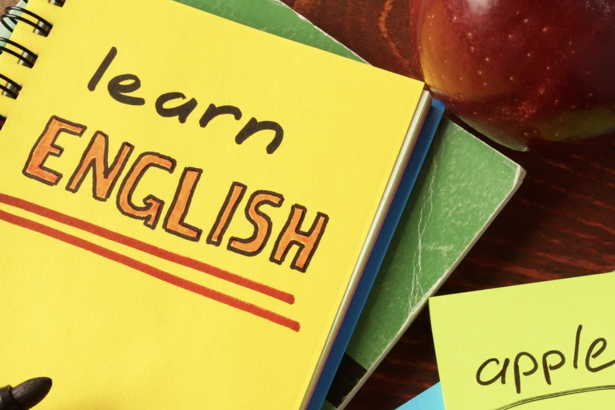 cuaderno con la frase learn english
